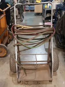 Used Uniweld Cutting Torch Head 830 acy/oxy with cart and hoses for sale