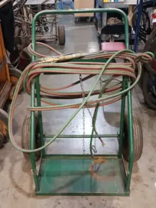 Used Victor Cutting Torch Head acy/oxy  with cart and hoses for sale