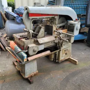 Racine Hydraulic Metal Saw with feeder platform